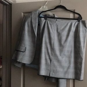 3 piece skirt jacket suite. Lace embroidered.